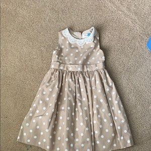 Girls’ white and tan polka dot dress